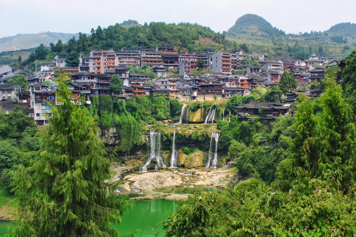 Furong Ancient Town: Hunan’s Waterfall Village That Looks Built for a Fantasy Film